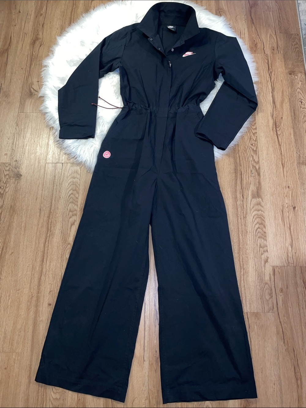 Nike Women's M Charcoal utility jumpsuit. Imperfection, elastic cord has split i